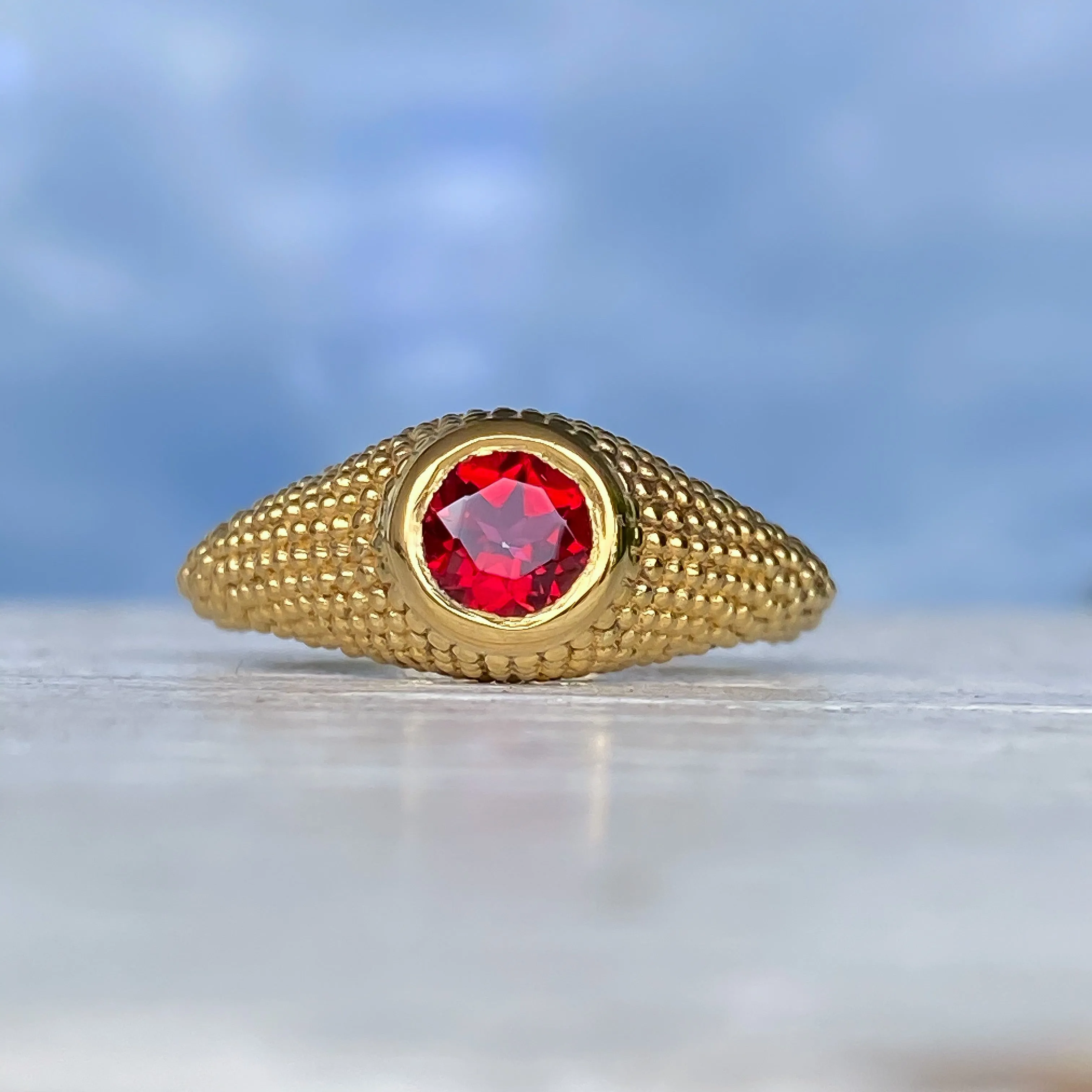 Nubia Round Red Topaz Yellow Gold Ring Size 7.5US