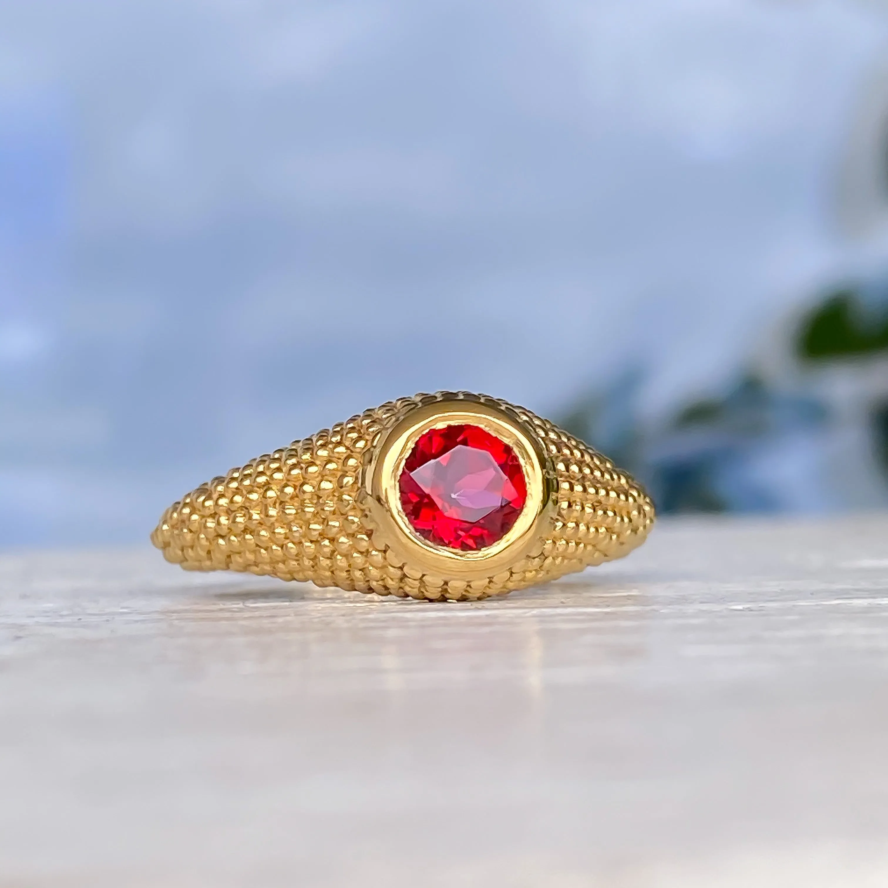 Nubia Round Red Topaz Yellow Gold Ring Size 7.5US