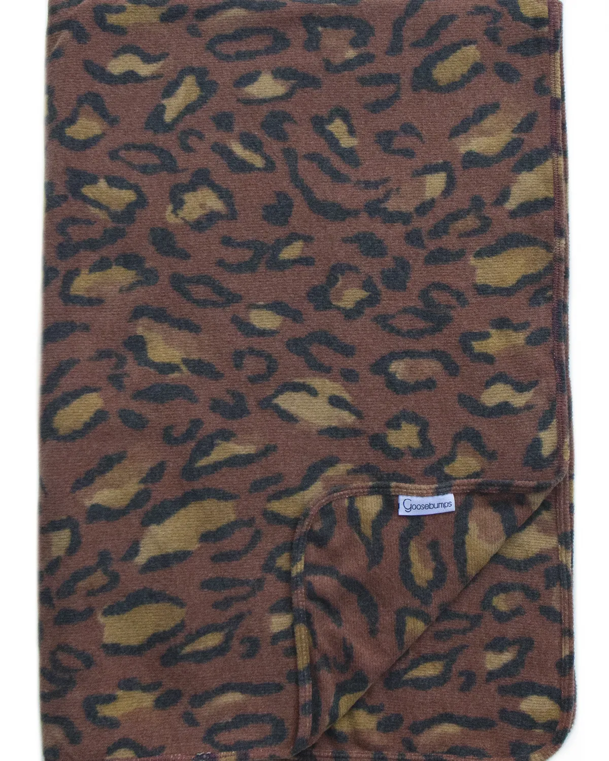 snow leopard throw / rust